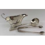 CHARLES BOYTON A VICTORIAN SILVER SAUCE LADLE, fiddle pattern, London 1847, with engraved heraldic