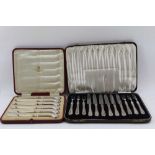 THOMAS BRADBURY & SONS LTD. A CASED SET OF SIX EDWARDIAN SILVER PISTOL GRIP HANDLED TEA KNIVES,