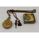 A DECORATIVE 9K GOLD OPEN FACE POCKET WATCH, gilded dial with Roman numerals, on a chain with