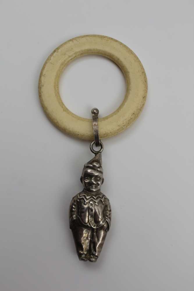 A SILVER MOUNTED CHILD'S TEETHING RING, bearing a silver clown figure, Birmingham 1971, a white - Image 2 of 9