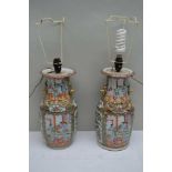 A PAIR OF CHINESE PORCELAIN FAMILLE ROSE VASES with applied gilded salamanders to the necks,