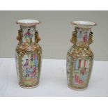 A PAIR OF LATE 19TH CENTURY CHINESE PORCELAIN FAMILLE ROSE VASES, gilded creatures to the neck,