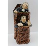 A 19TH CENTURY STAFFORDSHIRE POTTERY 'VICAR & MOSES' PULPIT GROUP, 25cm high