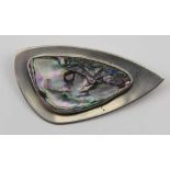 ARNE JOHANSEN - A STERLING SILVER & ABALONE SHELL AMORPHIC FORM BROOCH, with raised centre, makers