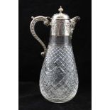 LEE & WIGFULL AN EDWARDIAN SILVER MOUNTED CUT GLASS CLARET JUG, hinged dome cover, embossed