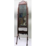 A WELL MADE LATE 19TH / EARLY 20TH CENTURY MAHOGANY FRAMED ADJUSTABLE CHEVAL MIRROR with fret cut