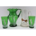 A MARY GREGORY JUG with piping figure decoration, 16cm high together with a green glass Mary Gregory