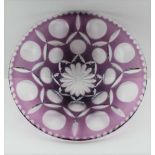 AN AMETHYST OVERLAID AND CUT GLASS SHALLOW BOWL, 30cm in diameter