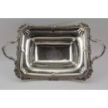 WILLIAM BURWASH A GEORGE III SILVER SERVING DISH, of oblong form, with two handles, gadrooned rim