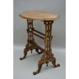 A LATE 19TH CENTURY WALNUT GOTHIC REVIVAL OCCASIONAL TABLE, with quarter veneered shaped top, on