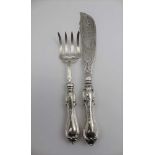 AARON HADFIELD A PAIR OF VICTORIAN SILVER FISH SERVERS, the blade engraved with an eagle, serpent