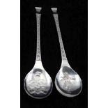JOHN PINCHES TWO COLLECTOR'S SILVER SPOONS, the bowls cast with Victorian Christmas themed