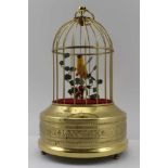 A 20TH CENTURY BRASS BIRD CAGE AUTOMATON, having ring suspension, engraved presentations, 24cm high