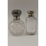 A VICTORIAN SILVER LIDDED GRENADE FORM SCENT BOTTLE, cut glass body, the lid floral decorated,