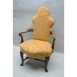 AN 18TH CENTURY BELIEVED DUTCH DESIGN ARMCHAIR, with old gold floral damask style upholstered