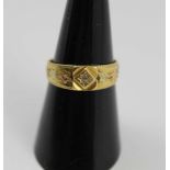 AN 18CT GOLD RING, inset diamond, the band with ivy decoration, weight; 3.2g, ring size; 'N'