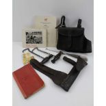 A QUANTITY OF HUNTING RELATED ITEMS, to include; a leather sandwich pouch, leather cased wire