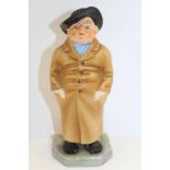 A ROYAL WORCESTER CERAMIC FIGURE 'Caddy', modelled by 'James Hadley', printed and painted factory