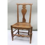 A 19TH CENTURY ELM SEATED CHAIR with turned fore stretcher