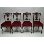 A SET OF FOUR FIRST-QUARTER 20TH CENTURY FANCY BACKED PROBABLE FRENCH CHAIRS, with claret