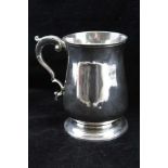 JOHN KIDDER A GEORGE III SILVER PINT TANKARD of baluster form, scroll handle with acanthus leaf