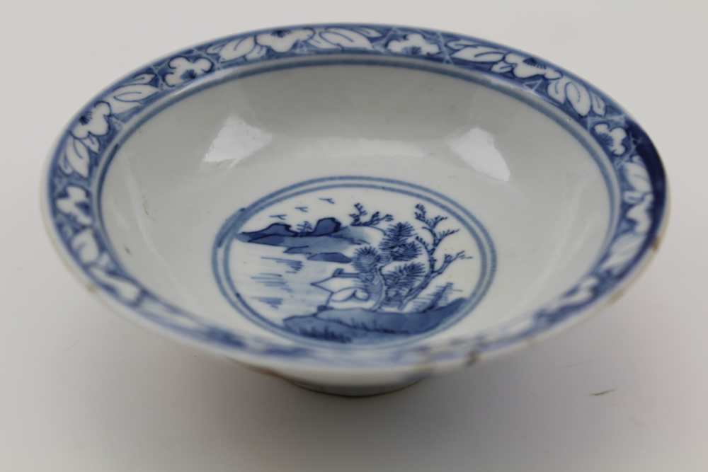 A CHINESE PORCELAIN SHALLOW BOWL in the manner of Ming Jiajing dynasty, underglaze blue painted