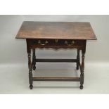 AN 18TH CENTURY OAK SIDE TABLE having rectangular plank top, single full width drawer, supported