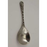 ROBERT ALLISON A SILVER CADDY SPOON, the handle cast with Celtic decoration, the reverse of the bowl