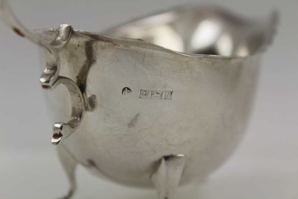 CHARLES BOYTON A VICTORIAN SILVER SAUCE LADLE, fiddle pattern, London 1847, with engraved heraldic - Image 3 of 8