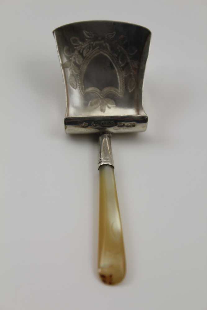 WILLIAM PUGH A GEORGE III SILVER CADDY SPOON of shovel form, with mother-of-pearl handle, Birmingham