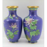 A PAIR OF CLOISONNE VASES of baluster form, blue ground with floral decoration, 16cm high