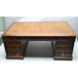 A LATE 19TH CENTURY MAHOGANY PARTNER'S DESK, with tooled rectangular insert skiver, three inline