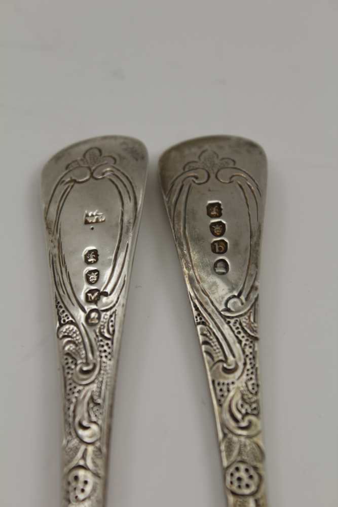 TWO GEORGE III SILVER BERRY SPOONS, repousse and chased decoration, London 1807 and 1817, combined - Image 4 of 4