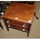 A 19TH CENTURY MAHOGANY FINISHED BOX COMODE, with two drawer faux front