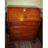 A WELL MADE REPRODUCTION POLLARD WOOD BUREAU with well fitted interior, over four graduating full