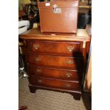 A REPRODUCTION MAHOGANY COLOURED BACHELORS STYLE CHEST with foldover top, with four further full