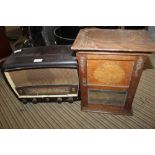 AN OAK FINISHED SMOKER'S COMPENDIUM CABINET together with a vintage valve radio, by Phillips