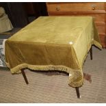 A FOLDING SQUARE TOPPED CARD TABLE with tasselled fringed cover