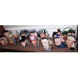 A SHELF FULL OF ROYAL DOULTON MEDIUM SIZED CHARACTER JUGS