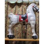 A PAINTED METAL CHILD'S GALLOPING PONY