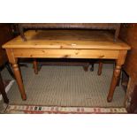 A MODERN PINE RECTANGULAR TOPPED COUNTRY KITCHEN TYPE TABLE