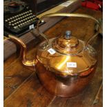 AN OVERSIZED COPPER KETTLE