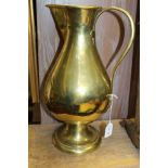 A 19TH CENTURY 'JONES & WILLIS' BRASS EWER, baluster form with circular platform foot, the handle