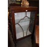 AN ART DECO DESIGN OAK CHINA CABINET with fancy bar glazed single door