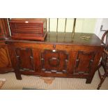 AN EARLY 19TH CENTURY ELM BOX COFFER, having plain plank lift-up top, the interior fitted with a