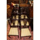 A REPRODUCTION SET OF EIGHT WHEATSHEAF BACK MAHOGANY COLOURED DINING CHAIRS, six singles, two