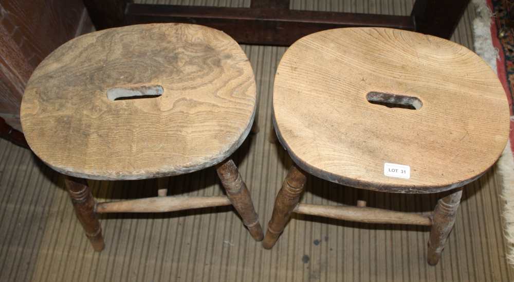 TWO RUSTIC ELM TOPPED FOUR LEGGED STOOLS