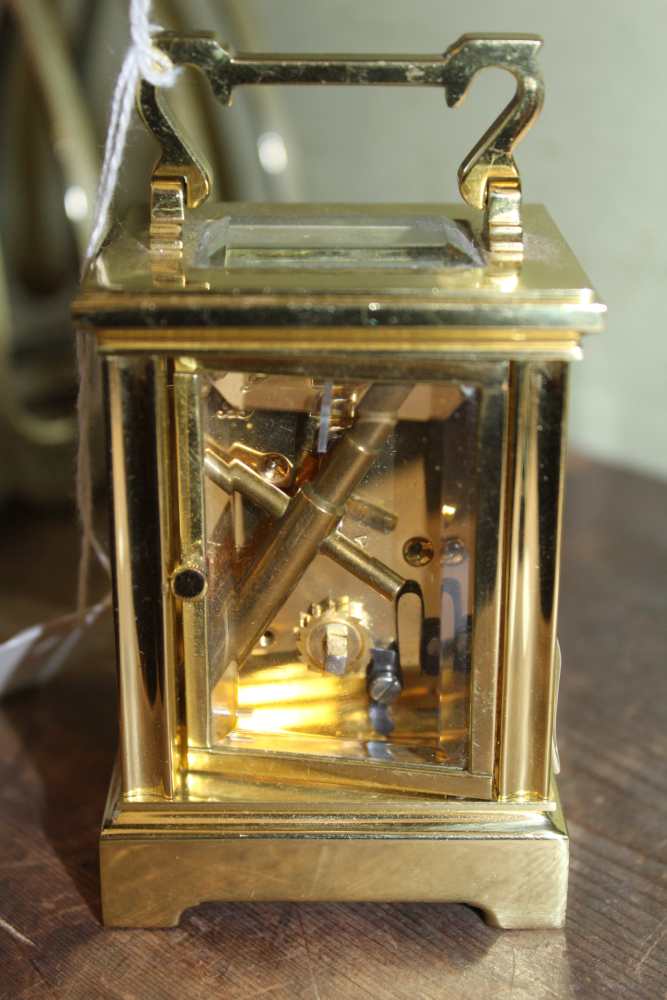 A VERY SMALL SIZED BRASS CASED CARRIAGE CLOCK - Image 2 of 2