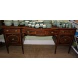 A 19TH CENTURY SHERATON STYLE MAHOGANY SIDEBOARD with satinwood inlay, having bow front central