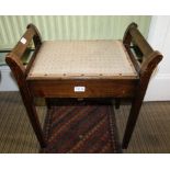 A STAINED BEECHWOOD PAD TOPPED PIANO STOOL, of typical form and construction